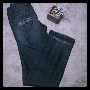 GUESS jeans Size 28. Low cut, boot-cut style.